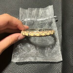 Brown and cream design bangle.